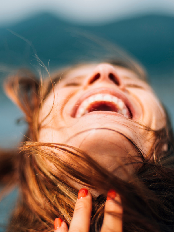 A joyful woman A joyful woman, Sweet cravings? Cognitive hypnotherapy in Colchester and online